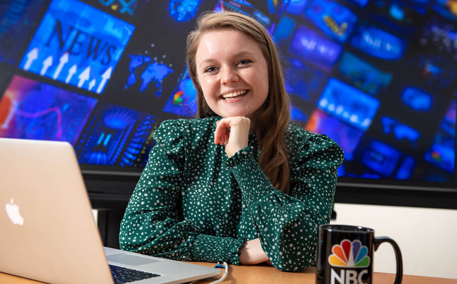 Photo of intern at NBC12 news desk