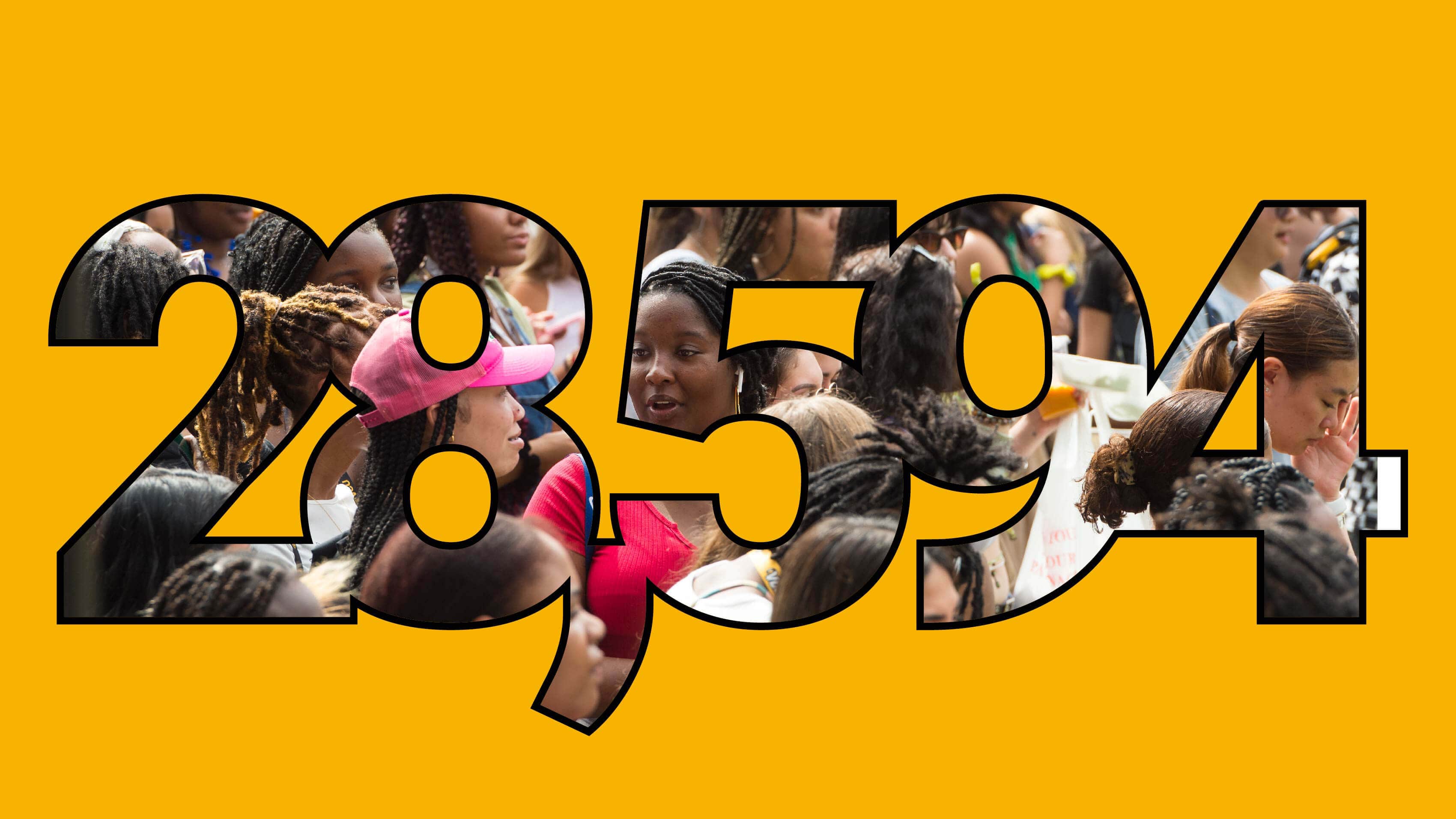Large graphic image of the nuber 28,594, filled by a photo of smiling VCU students