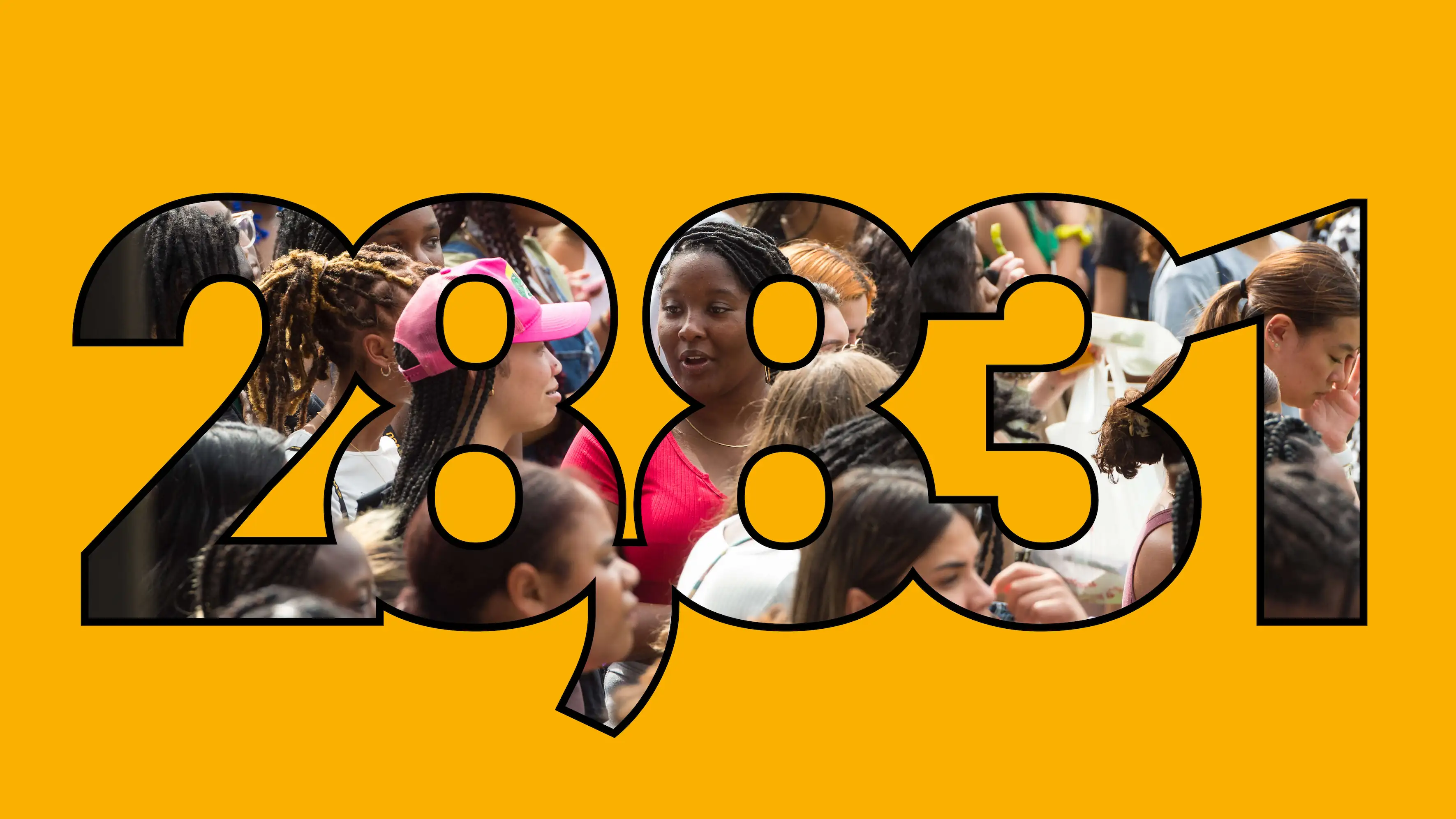 Large graphic image of the number 28,831, filled by a photo of smiling VCU students.