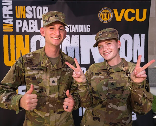 Two VCU students wearing camouflage uniforms